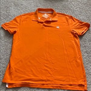 Express Fitted Polo in Orange.
